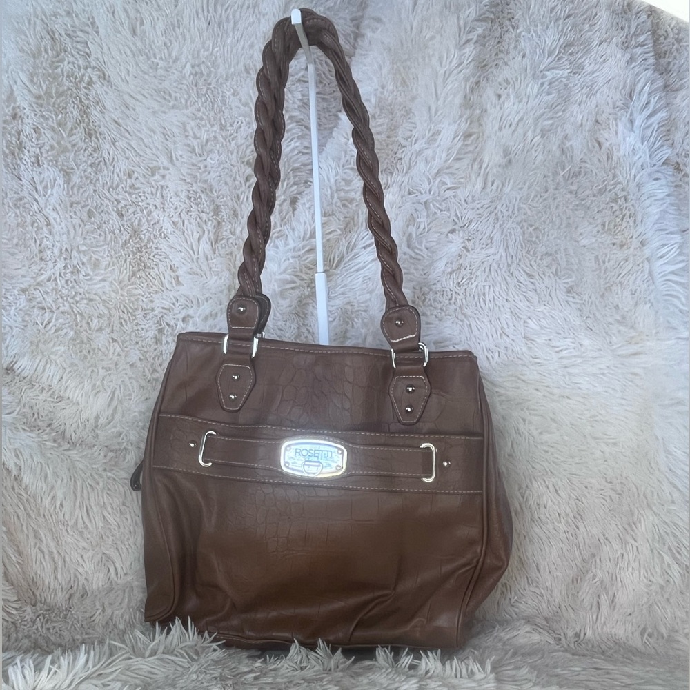Rosetti brown leather purse. Comes with mini purse attached to front pocket.